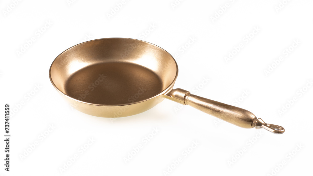 golden rich frying pan isolated on white background golden rich frying pan isolated on white background