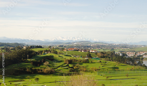 Cantabria  view inland over Liencres area  snow on Picos de Europa mountain range