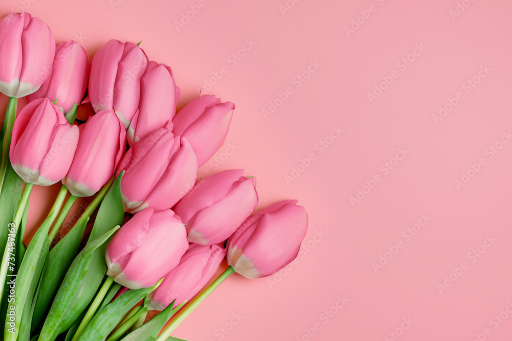 Beautiful composition spring flowers. Bouquet of  flowers on pastel pink background. Valentine's Day, Easter, Birthday, Happy Women's Day, Mother's Day. top view, copy space
