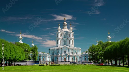 SAINT-PETERSBURG, RUSSIA - JUNE, 2023: The facade of the Smolny Cathedral, historical orthodox church and monastery, timelapse and hyperlapse view of a famous city touristic landmark at. photo