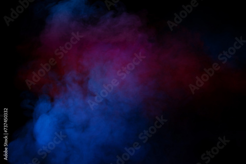 Purple and blue steam on a black background. © Nikolay