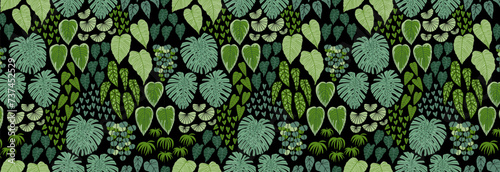 Seamless pattern with tropical leaves of different shapes. Vector illustration in flat style. Design for fabric etc.
