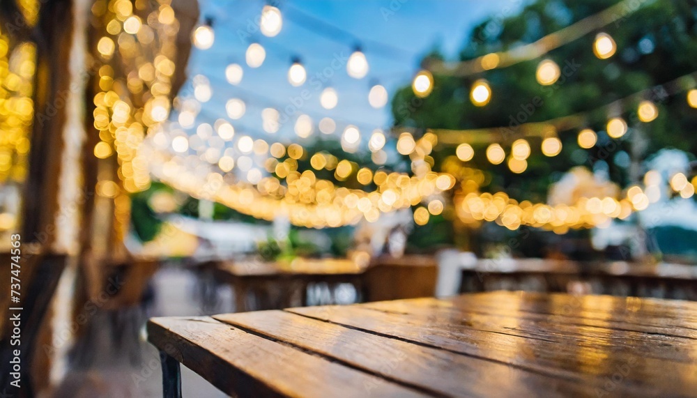 blurred background of restaurant with abstract bokeh light lights decoration party event festival holiday blur background outdoor string lights digital - obrazy, fototapety, plakaty 