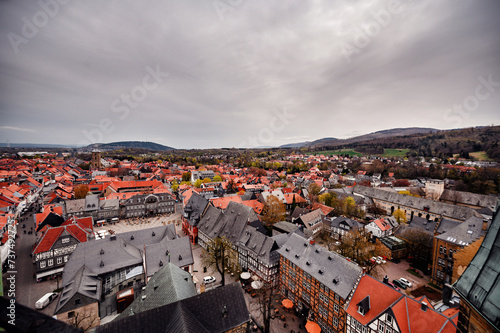 Expansive Overhead View of a Historic European Town with Red Roofs and Lush Surroundings. Goslar city