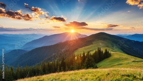 the sun sets over the mountain ranges carpathian mountains ukraine europe photo