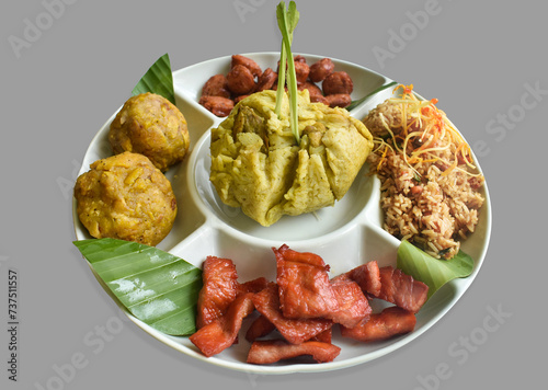 Amazonian round: Juanes, typical Amazonian food in banana leaves. Typical jungle food with rice, chicken and dresses. Peruvian food