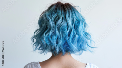 Rear view of blue hair of girl with ombre balayage haircolor 