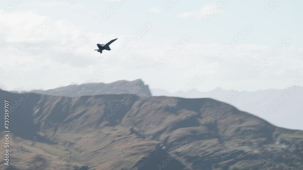 An FA-18 Hornet jet during the flight demonstration at Axalp in Switzerland. An FA-18 Hornet jet during the flight demonstration at Axalp in Switzerland.