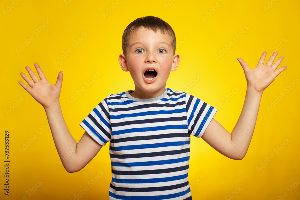 Surprised Young Boy in Striped Shirt Surprised Young Boy in Striped Shirt