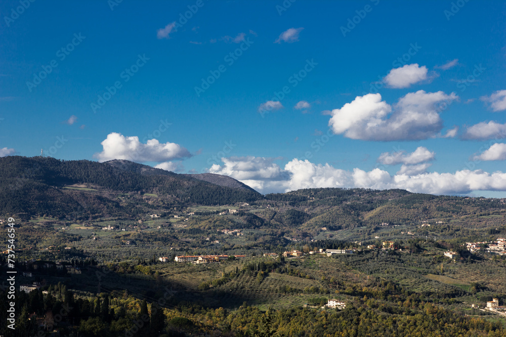 Small village in Italy. Mountain village landscape. Hills background. North of Italy. Fiesole city viewpoint. Scenic view of Italian hill.