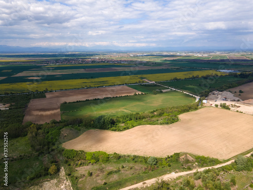 Blooming rapeseed field near village of Kostievo, Bulgaria photo