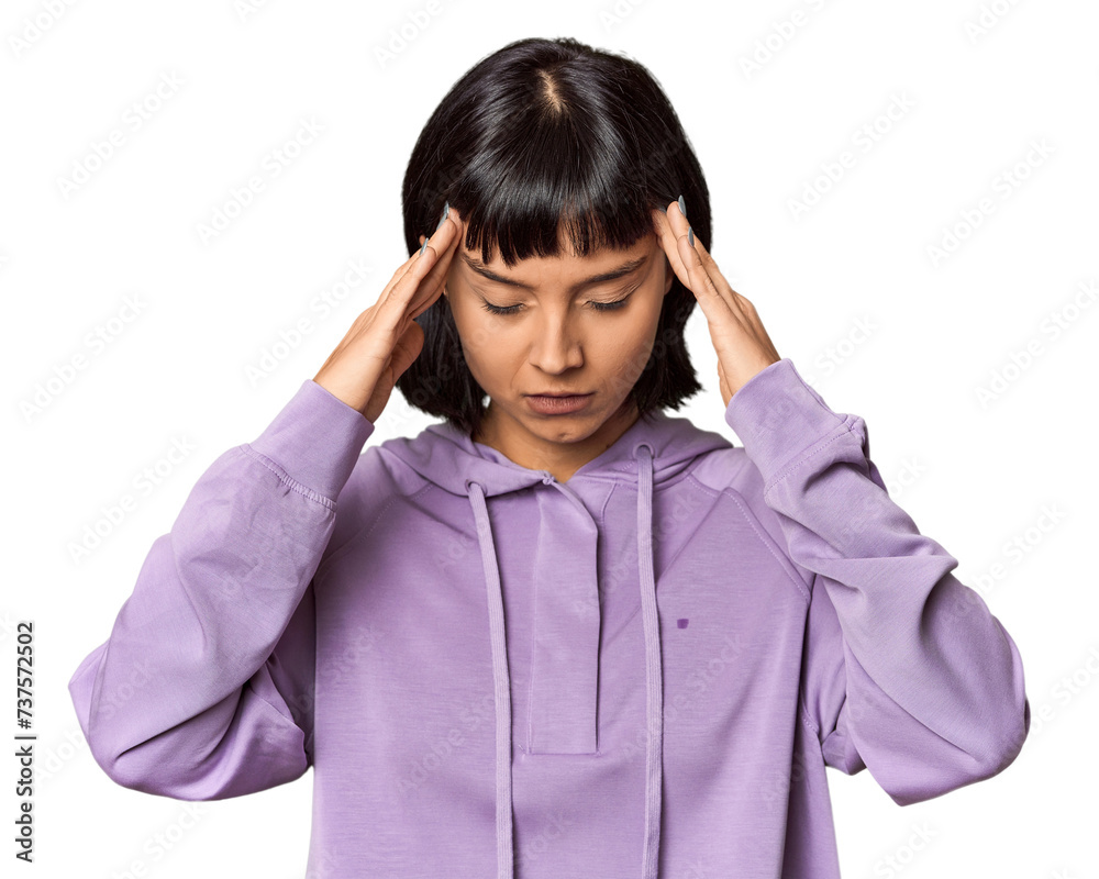 Young Hispanic woman with short black hair in studio touching temples and having headache. Young Hispanic woman with short black hair in studio touching temples and having headache.