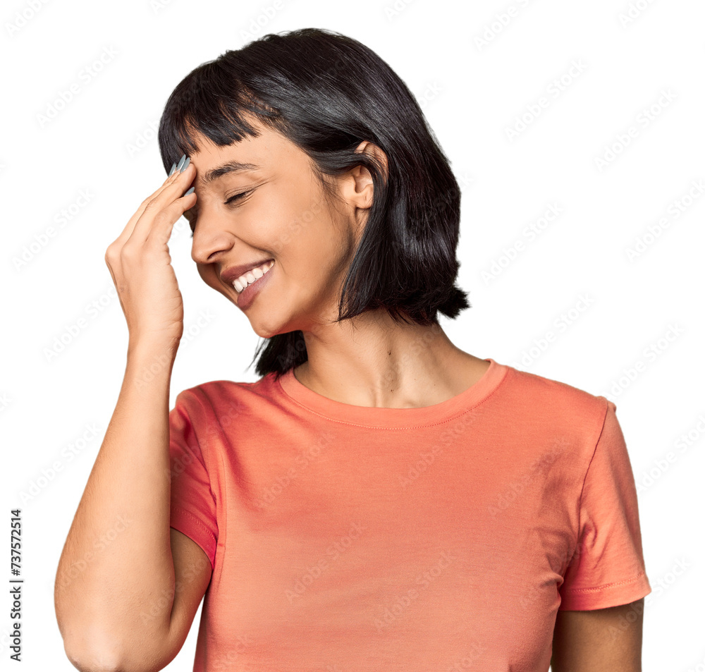 Young Hispanic woman with short black hair in studio laughing happy, carefree, natural emotion. Young Hispanic woman with short black hair in studio laughing happy, carefree, natural emotion.
