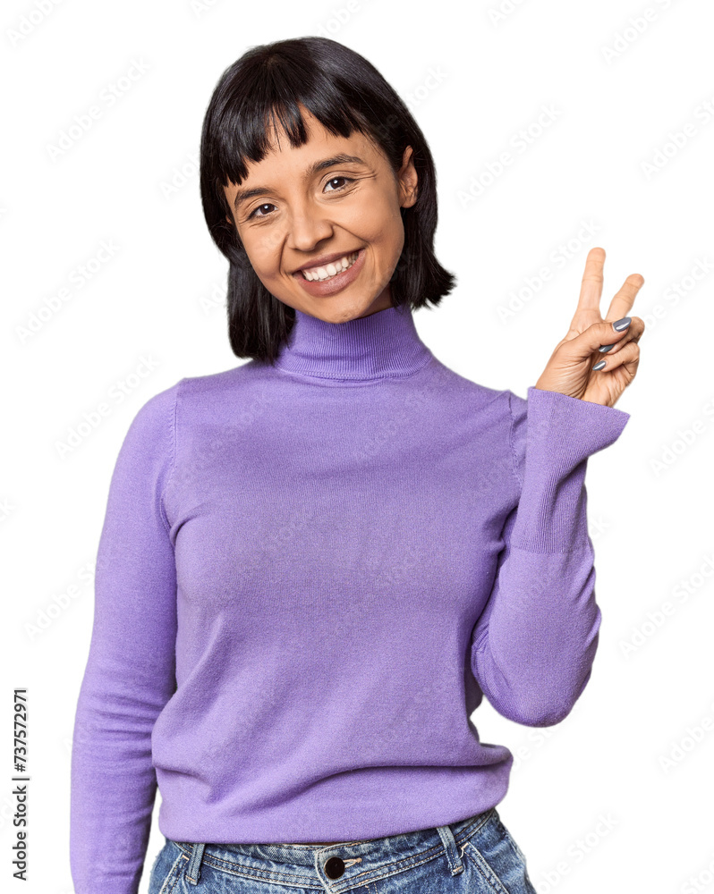 Young Hispanic woman with short black hair in studio showing number two with fingers. Young Hispanic woman with short black hair in studio showing number two with fingers.