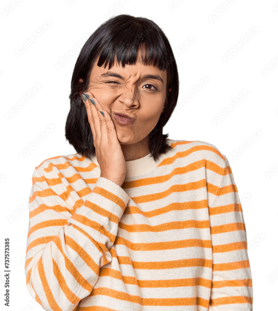 Young Hispanic woman with short black hair in studio who is bored, fatigued and need a relax day. Young Hispanic woman with short black hair in studio who is bored, fatigued and need a relax day.