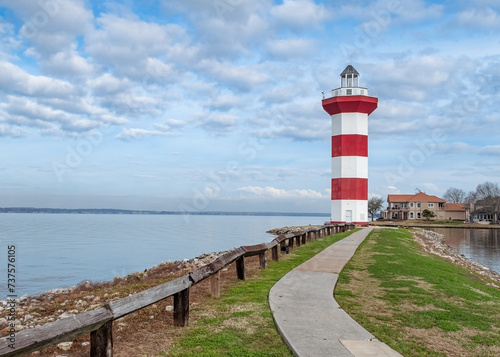 Lighthouse on Lake Conroe with clouds in background