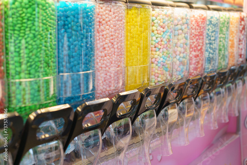 Candy Dispenser Array with Colorful Sweets