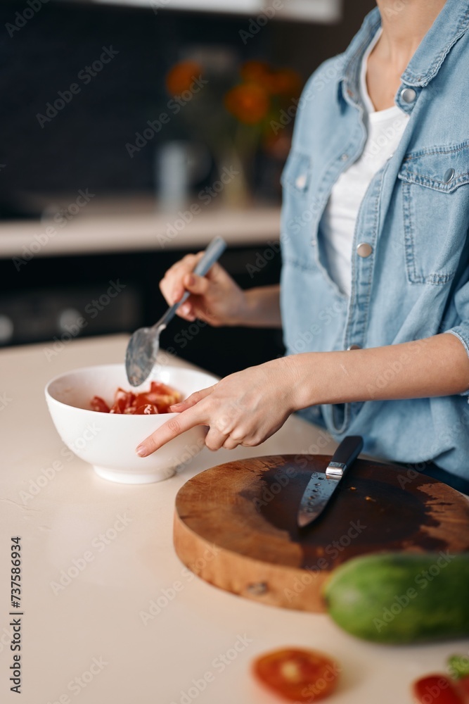 Fresh Healthy Kitchen: Woman Cooks a Vegetarian Salad with Organic Ingredients Fresh Healthy Kitchen: Woman Cooks a Vegetarian Salad with Organic Ingredients