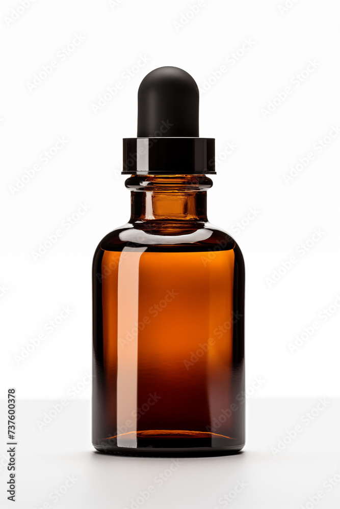 A brown bottle of aromatherapy essential oil on white background
