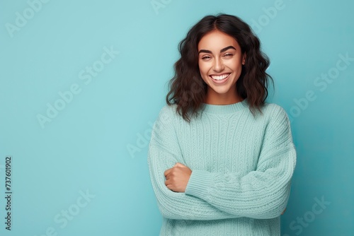fun young woman wear knitted sweater hold in hand use mobile cell phone look aside on workspace isolated on plain pastel light blue cyan background studio portrait - generative ai