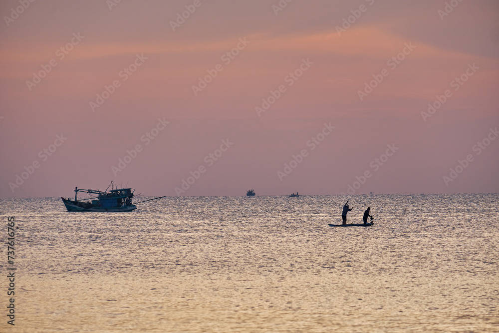 Fishing boat at sea in the evening at sunset on Phu Quoc Island of Vietnam.