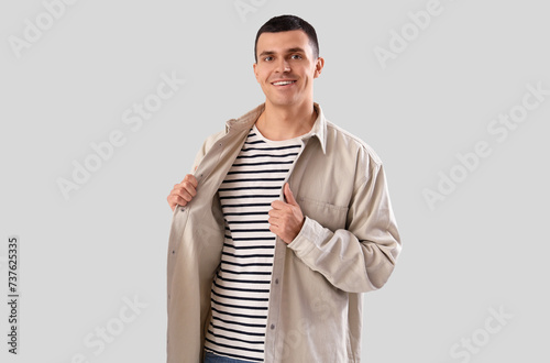Stylish young man in denim ...