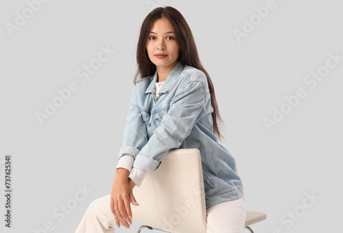 Stylish young Asian woman i...