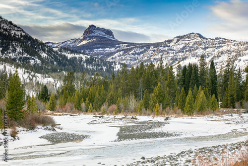 Washakie Wilderness snow-covered winter landscape and icy north fork Shoshone River in Shoshone National Forest in the Yellowstone Ecosystem of northwest Wyoming, USA photo