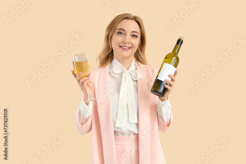 Mature woman with glass and...
