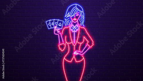 A female croupier with poker cards in her hand. A concept with a person on the casino theme.