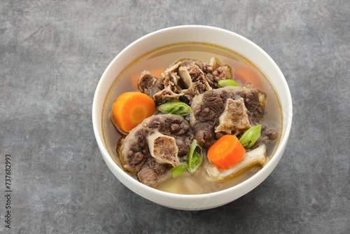 Sop Buntut or Oxtail Soup with carrot and potatoes. Indonesian traditional food
 photo