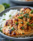 Grilled coconut chicken fillet with rice and parsley, selective focus