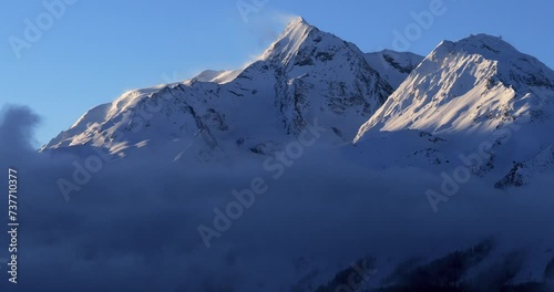 Sunrise over the Mont Pourri and Aiguille Rouge from La Rosiere, Savoie, France. photo