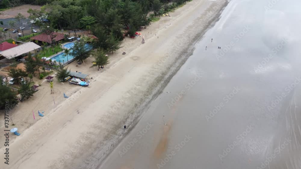 View of a quiet beach, with a beautiful stretch of sand in Pagatan View of a quiet beach, with a beautiful stretch of sand in Pagatan