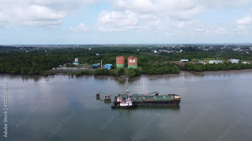 Aerial view of a large palm oil storage tank carried by an oil tanker Aerial view of a large palm oil storage tank carried by an oil tanker