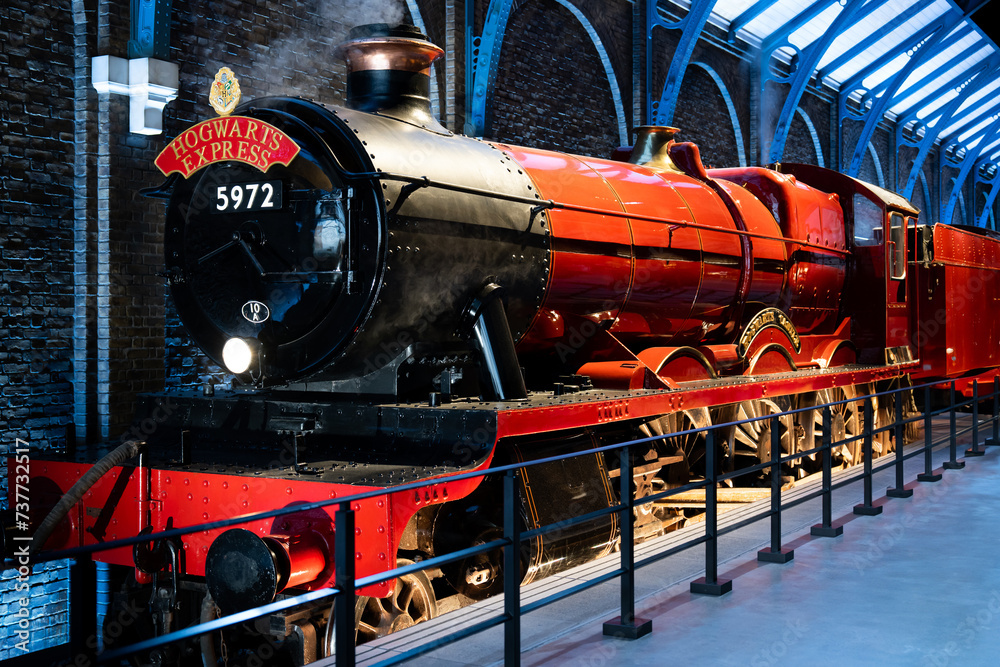 Naklejka premium JAPAN - NOV 13, 2023: Hogwarts Railways history, a meticulously restored vintage steam locomotive stands proudly on display in Warner Bros. Studio Tour Tokyo Japan, The Making of Harry Potter