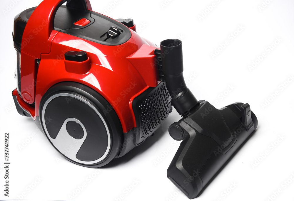 Red modern vacuum cleaner on a white background Red modern vacuum cleaner on a white background