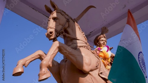 Statue of Teelu Rauteli: 17th Century Garhwali Rajput Warrior Riding Horse with Weapons, Gurrad Talla, Chaundkot, Pauri Garhwal, Uttarakhand photo
