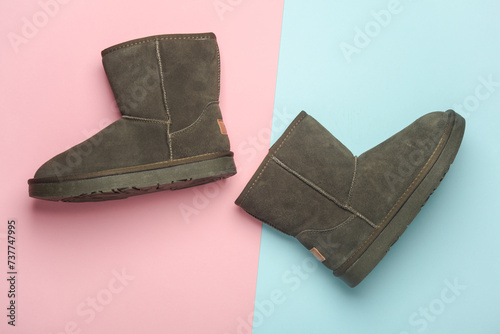 Women's suede boots with fur, blue-pink background