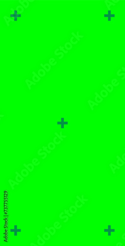 Green screen background, VFX motion tracking markers. Art design green screen backdrop template. Abstract concept video footage replacement tracking markers element. 