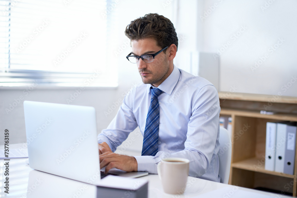 Businessman, laptop and typing in online email or communication as financial consultant, research or internet. Male person, glasses and corporate company in New York or accounting, loan or investment Businessman, laptop and typing in online email or communication as financial consultant, research or internet. Male person, glasses and corporate company in New York or accounting, loan or investment