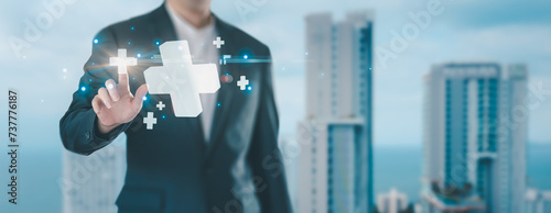 plus sign icon floating in the air on hand It symbolizes the introduction of positive elements such as personal development, social profit, health insurance and a growth mindset.