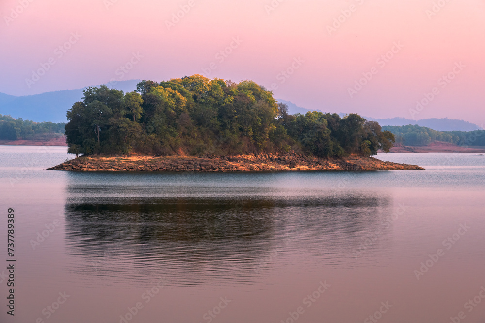 Sunset on the river.  Tawa Reservoir is a reservoir on the Tawa River in central India. It is located in Itarsi of Narmadapuram District of Madhya Pradesh, India.
