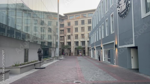 An alleyway in the late afternoon on a summer evening in the Silo District of the famous Victoria and Alfred Waterfront in Cape Town, South Africa. photo