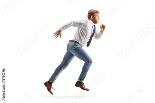 Full length profile shot of a white collar worker running