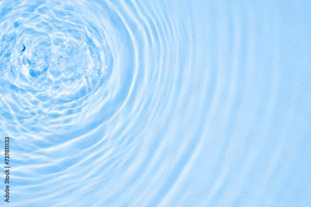 Abstract transparent water shadow surface texture natural ripple on blue background Abstract transparent water shadow surface texture natural ripple on blue background