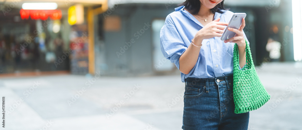 © dodotone - Business asian woman using smartphone city lifestyles with casual fashion positive look © dodotone - Business asian woman using smartphone city lifestyles with casual fashion positive look