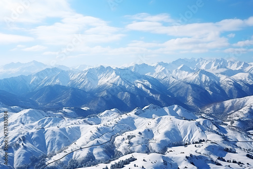 Beautiful landscape with snow-capped mountain peaks and blue sky. Generated by artificial intelligence