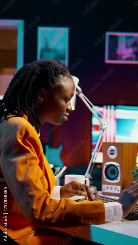 Vertical Video African american girl uses artificial intelligence software for machine learning and cloud computing, terminal window programming language. IT student studying deep learning AI hardware Vertical Video African american girl uses artificial intelligence software for machine learning and cloud computing, terminal window programming language. IT student studying deep learning AI hardware