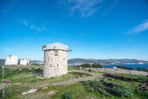 The windmills of Bodrum are a collection of stone buildings that were constructed in the 18th century and were used to grind grain into flour located on the hills between Bodrum and Gumbet,  Yalikavak photo